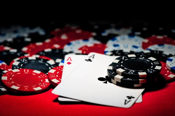 Live dealer studio showing Dragon Tiger table with professional cards and chip placement
